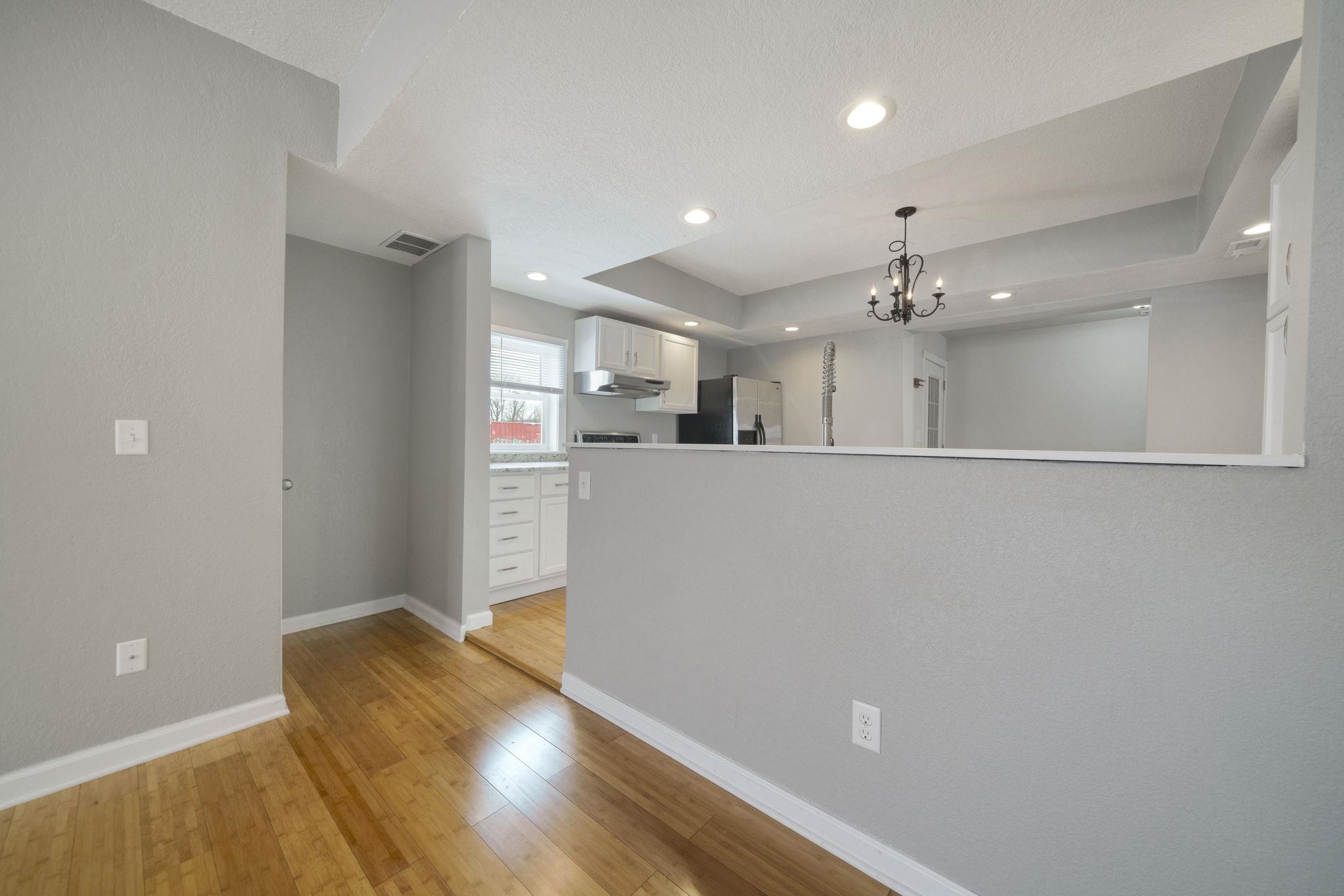 1104 South 4th Street Oregon, IL 61061 - Photo 12 of 36 a view of a kitchen with wooden floor