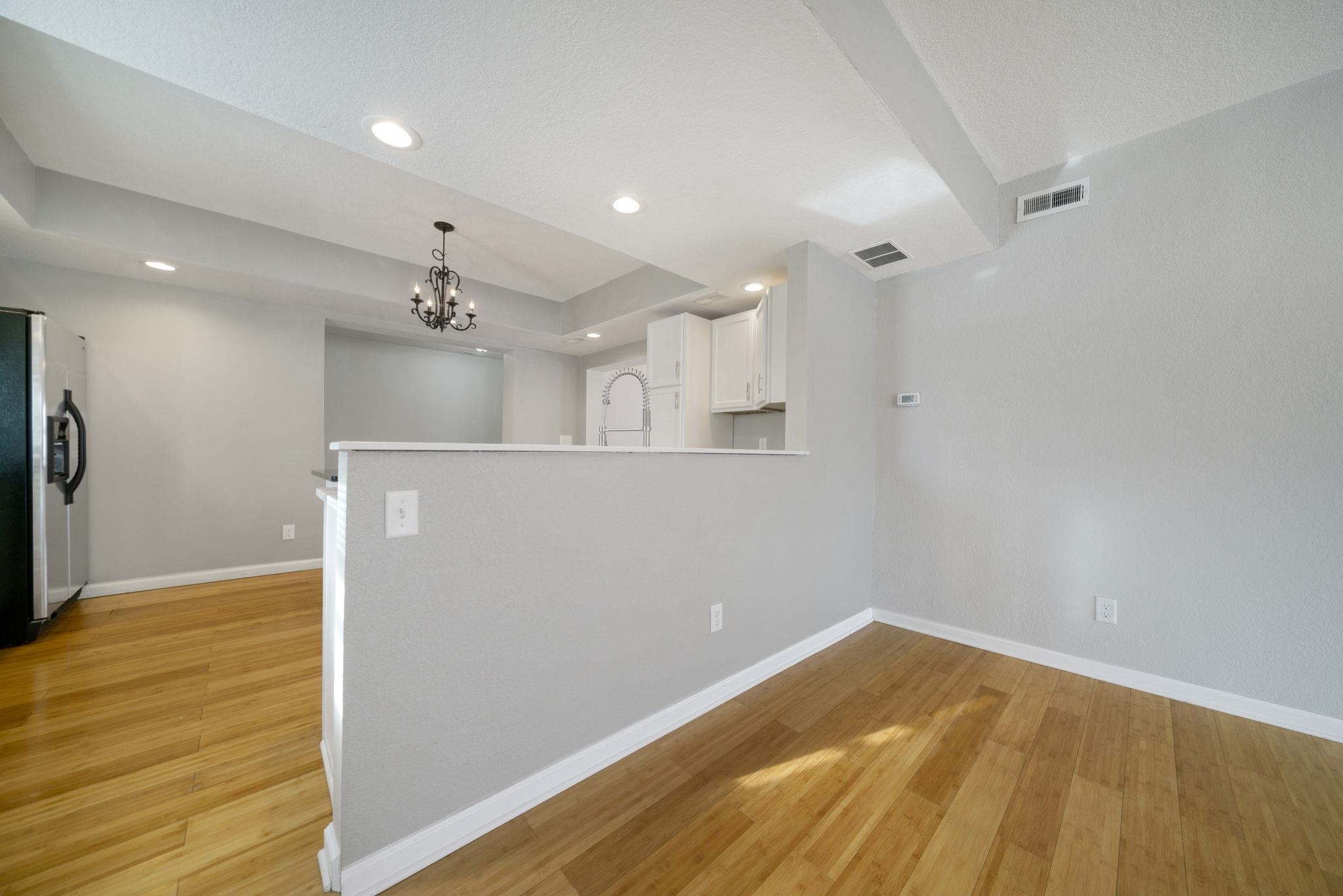 1104 South 4th Street Oregon, IL 61061 - Photo 13 of 36 an empty room with wooden floor