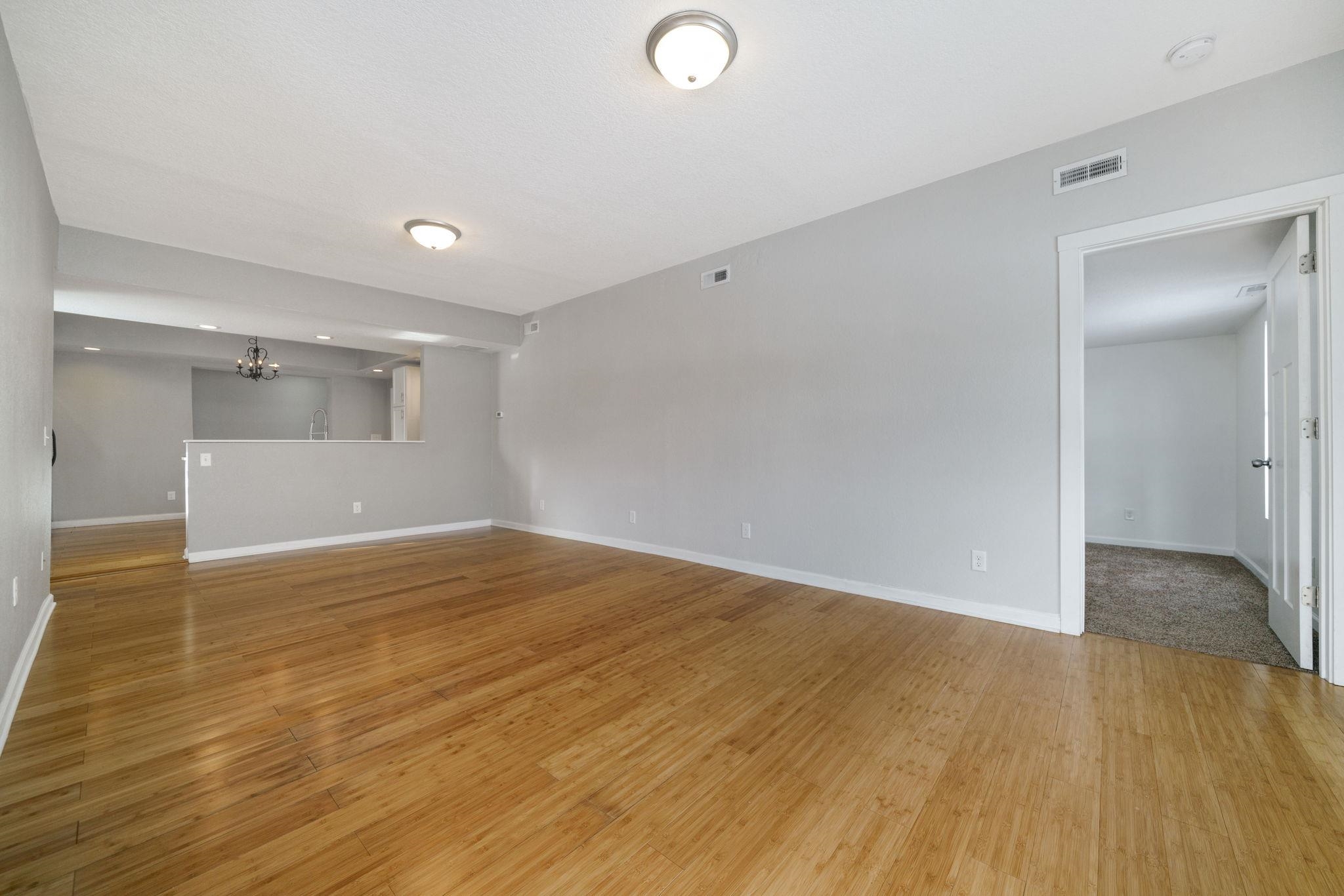 1104 South 4th Street Oregon, IL 61061 - Photo 4 of 36 a view of empty room with wooden floor