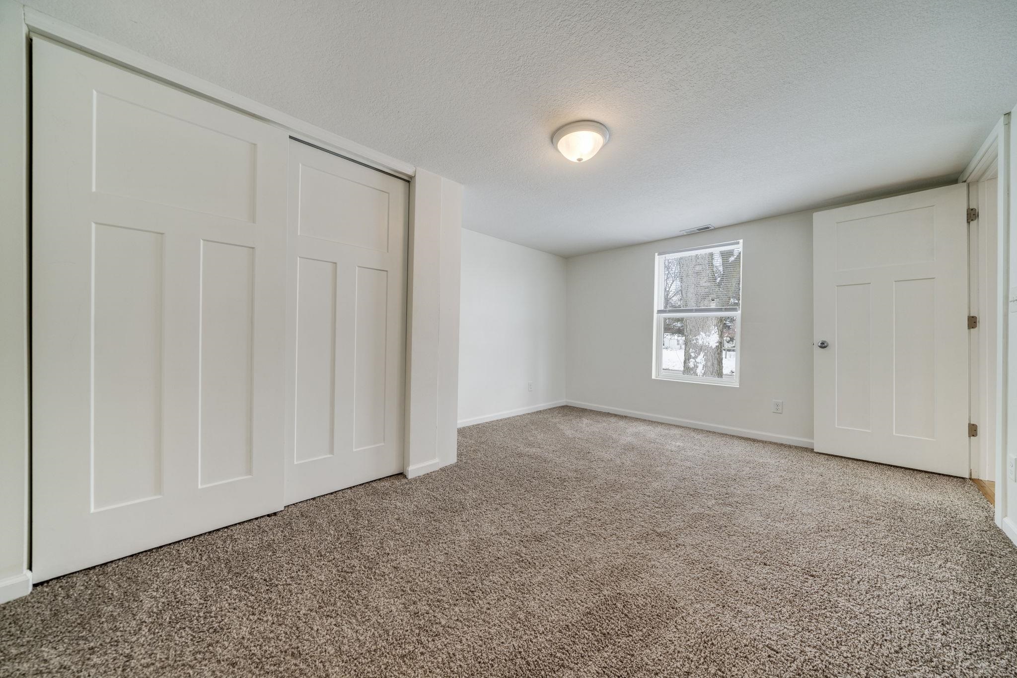 1104 South 4th Street Oregon, IL 61061 - Photo 7 of 36 a view of an empty room and a window