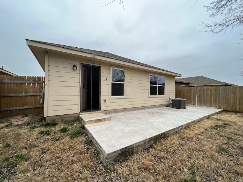 3208 Tilmon Ln. Austin, TX 78725 - Photo 20 of 21 a view of a backyard of the house