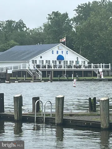 a aerial view of a house with roof deck