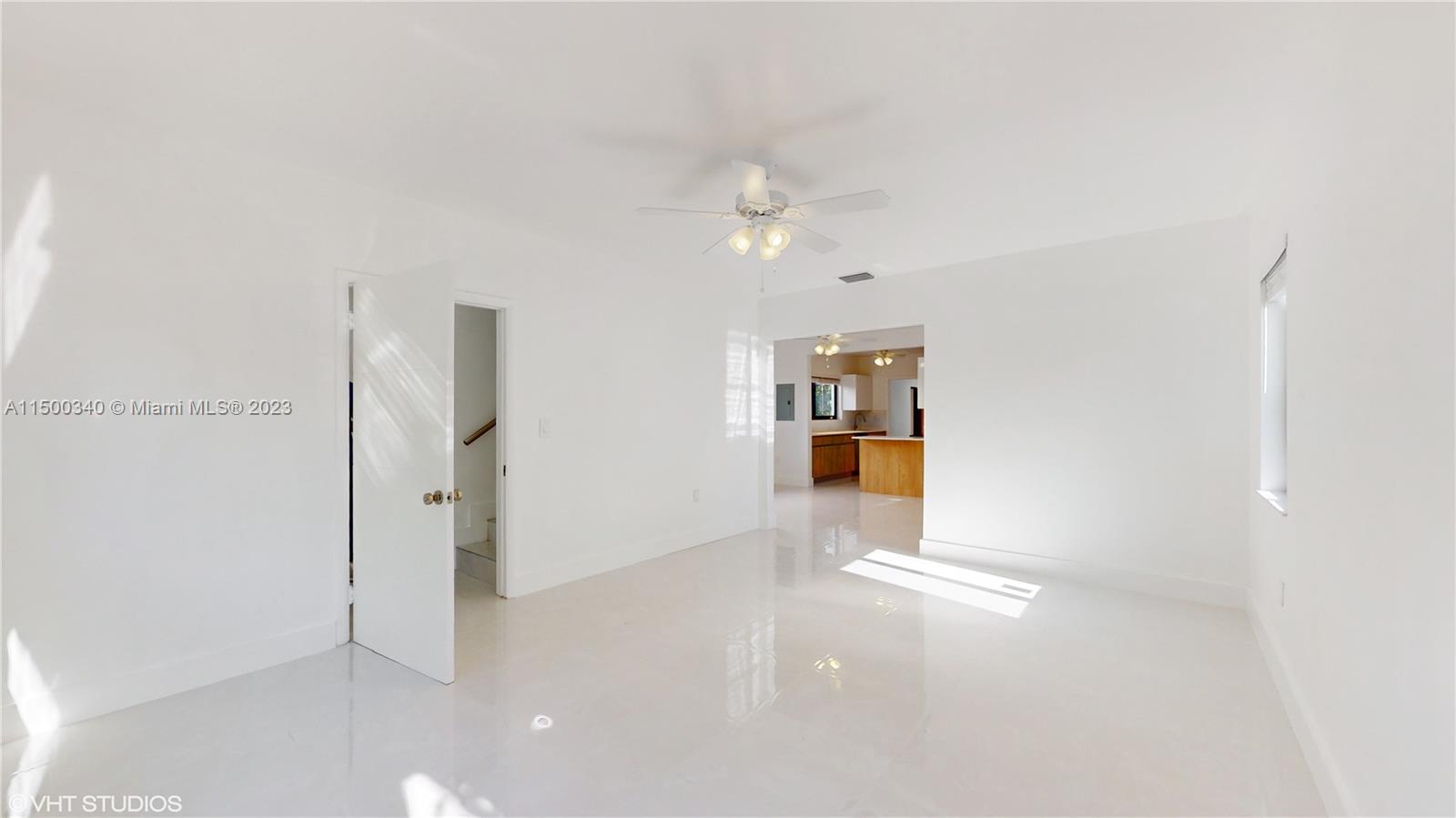 325 Southwest 30th Road, Unit L Miami, FL 33129 - Photo 11 of 25 wooden floor in an empty room