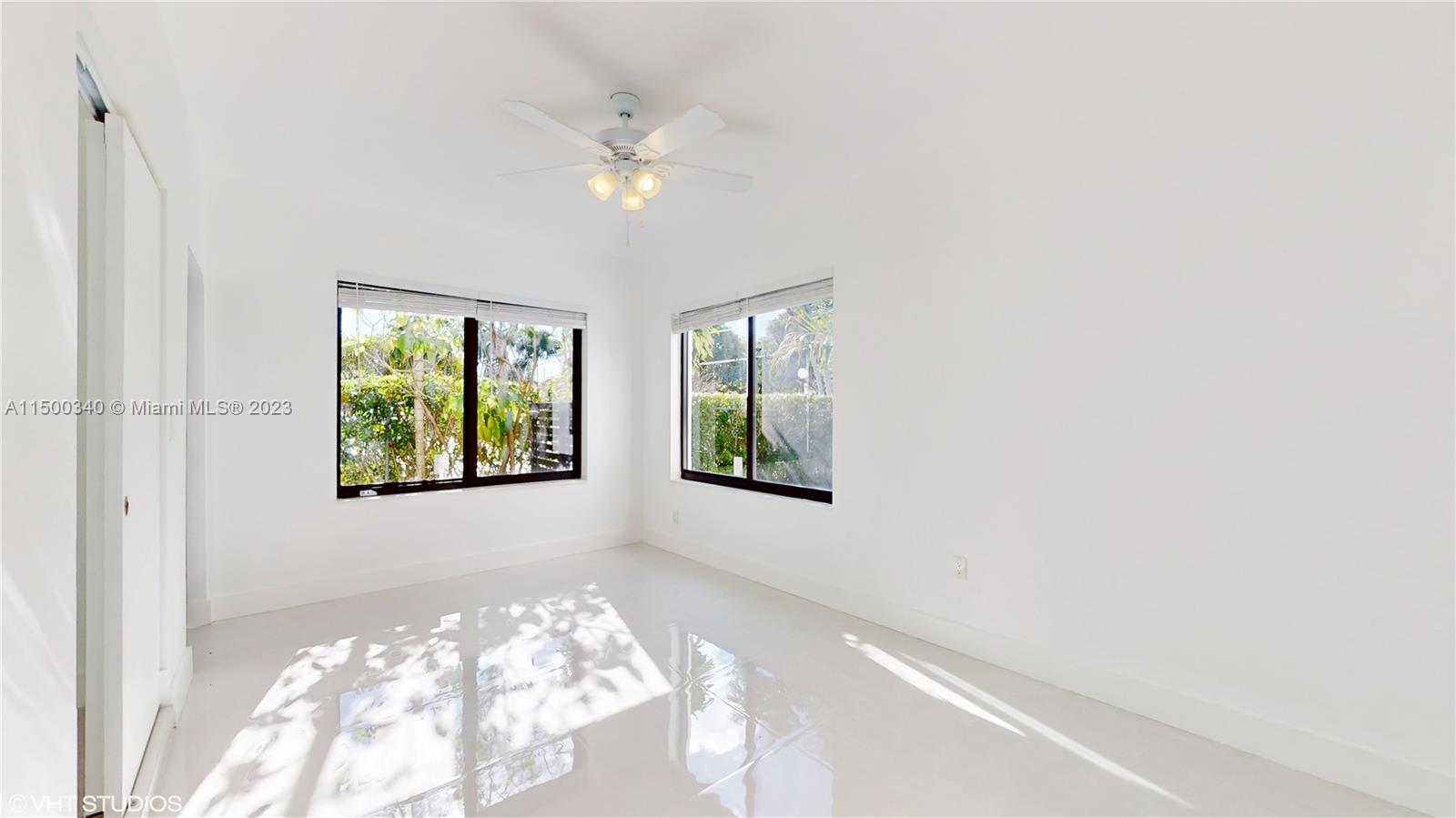 325 Southwest 30th Road, Unit L Miami, FL 33129 - Photo 16 of 25 a view of a livingroom with the front door