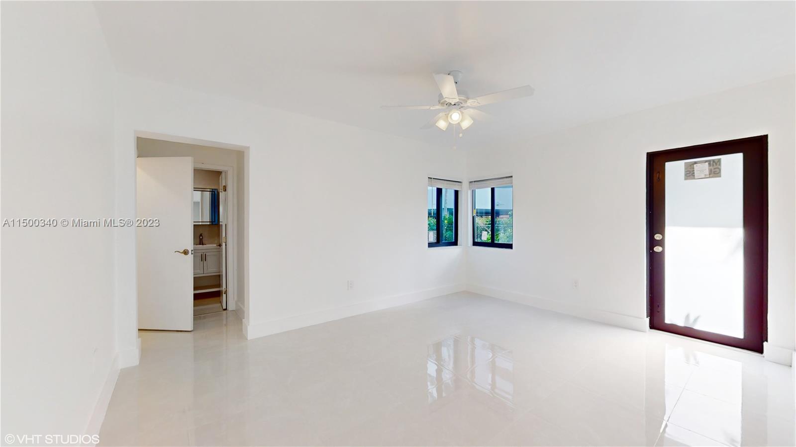 325 Southwest 30th Road, Unit L Miami, FL 33129 - Photo 18 of 25 a view of empty room with closet