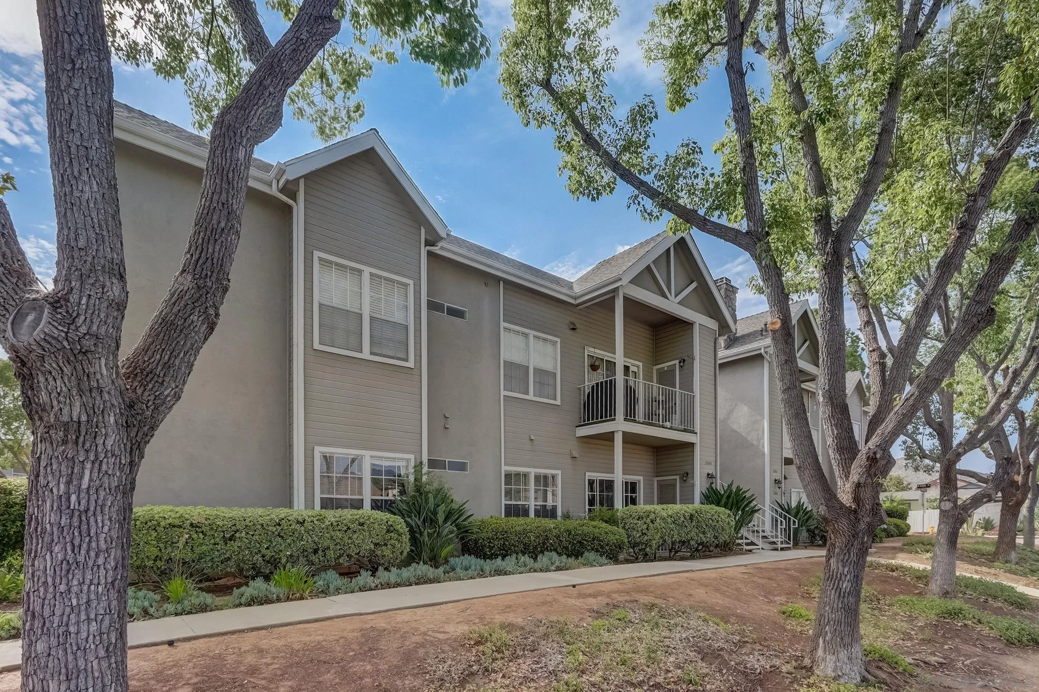 13832 Midland Road Poway, CA 92064 - Photo 1 of 36 a front view of a house with a garden