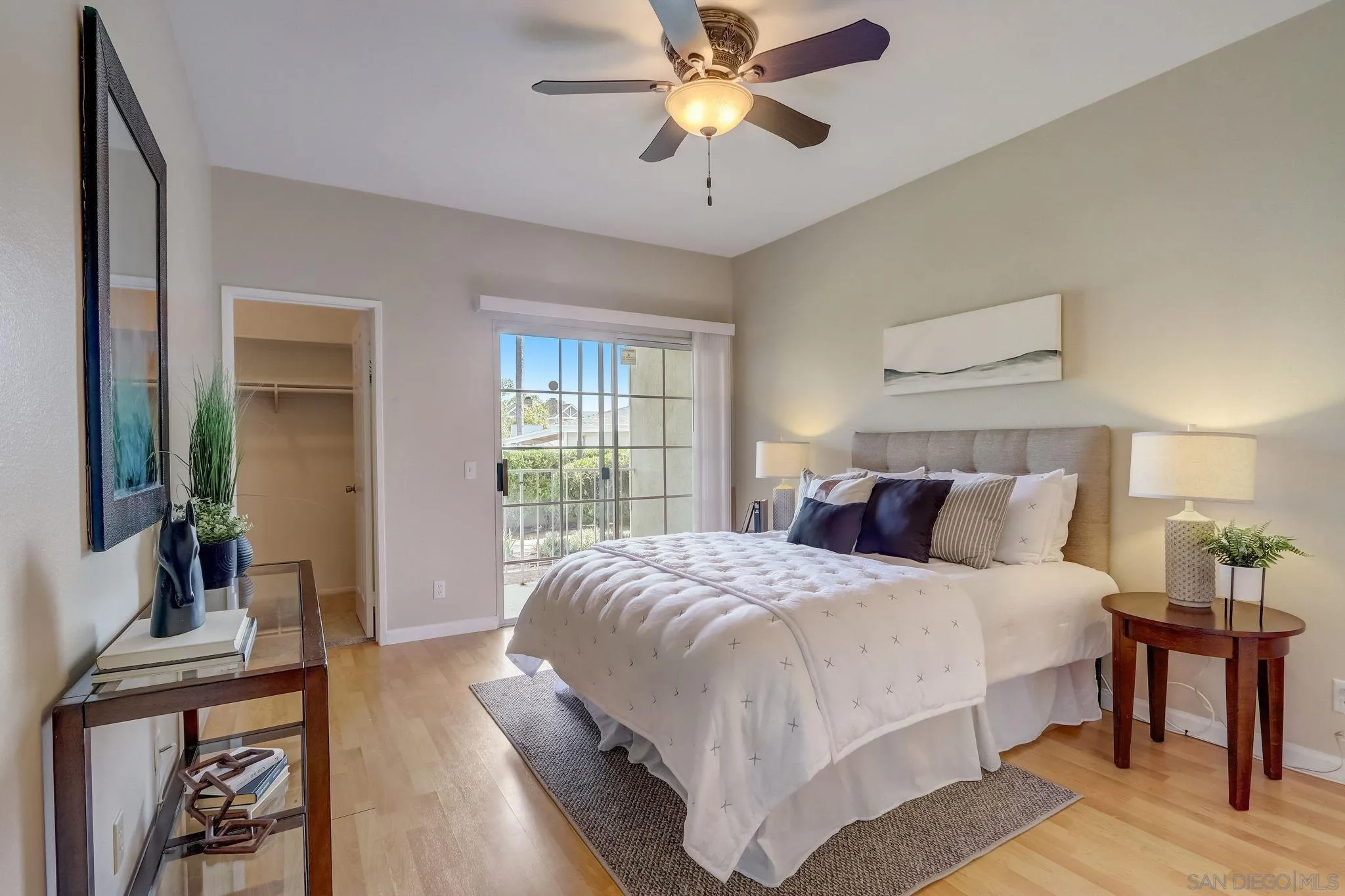 13832 Midland Road Poway, CA 92064 - Photo 16 of 36 a bedroom with a balcony a bed and a chandelier