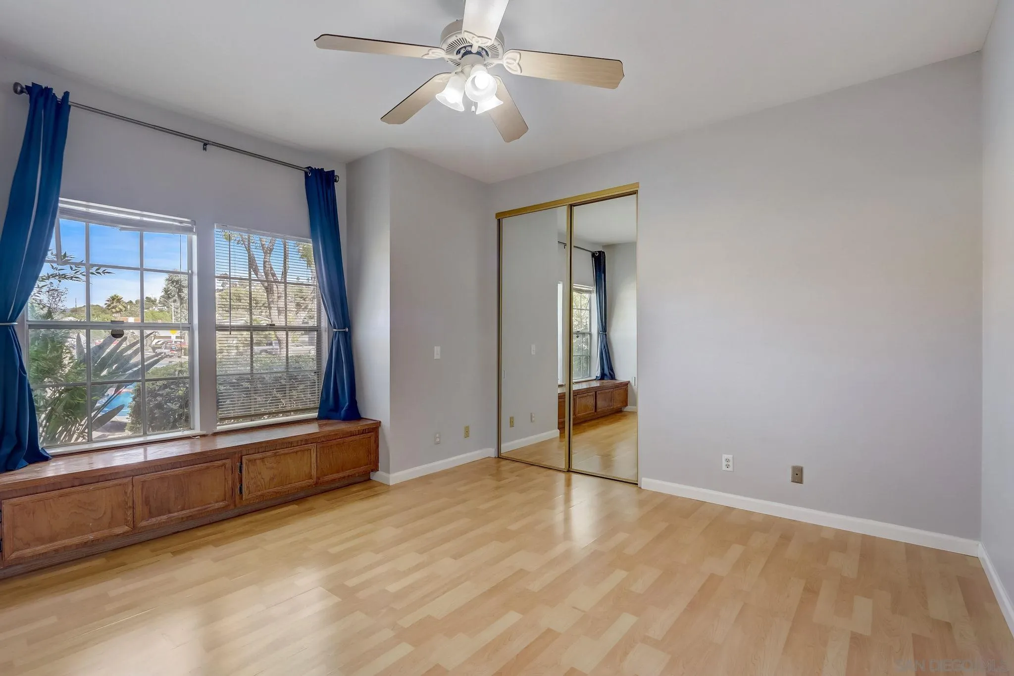 13832 Midland Road Poway, CA 92064 - Photo 26 of 36 a view of an empty room with a window and a kitchen area