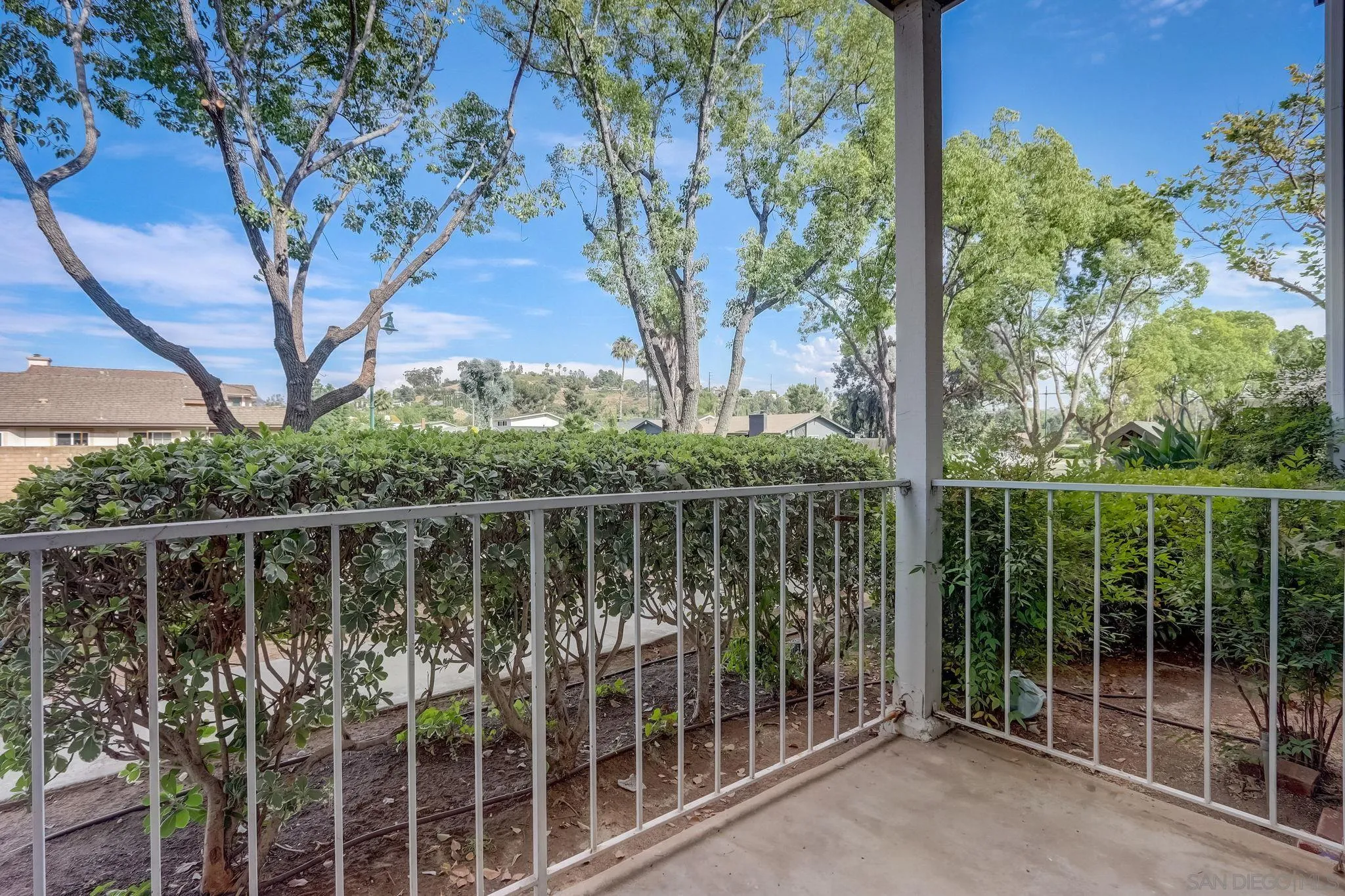 13832 Midland Road Poway, CA 92064 - Photo 30 of 36 a view of a balcony with a tree