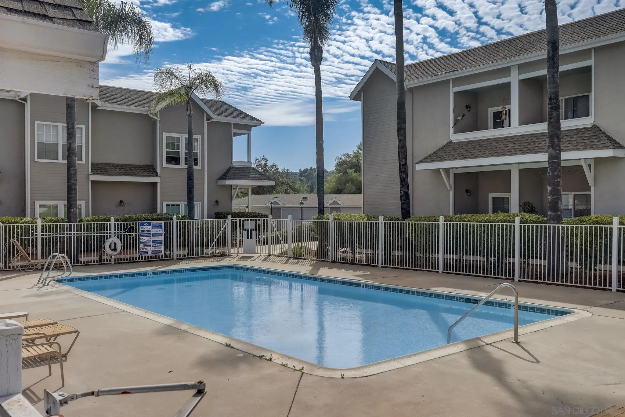 13832 Midland Road Poway, CA 92064 - Photo 33 of 36 a view of a swimming pool with a patio and a yard