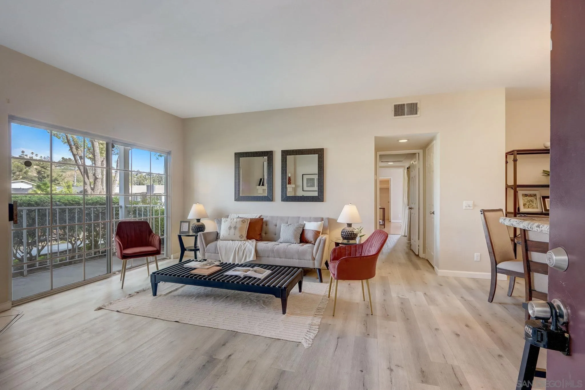 13832 Midland Road Poway, CA 92064 - Photo 4 of 36 a living room with furniture and a wooden floor