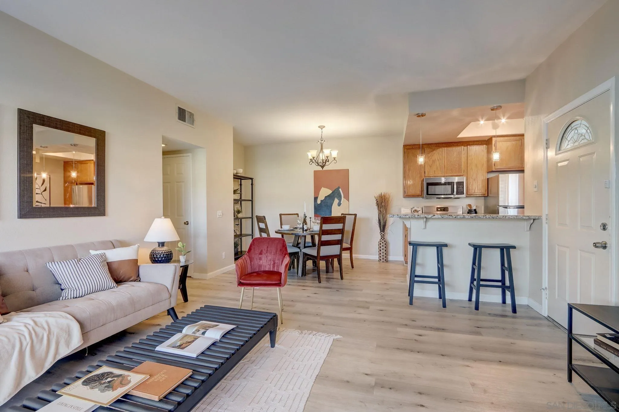 13832 Midland Road Poway, CA 92064 - Photo 6 of 36 a living room with furniture kitchen view and a table