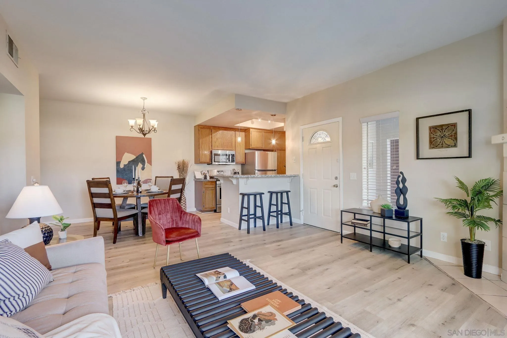 13832 Midland Road Poway, CA 92064 - Photo 7 of 36 a living room with furniture and wooden floor