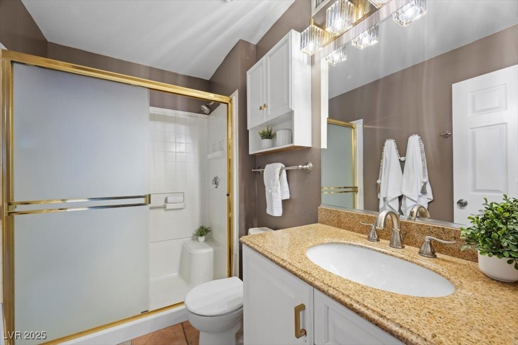 2995 East Sunset Road, Unit 134 Las Vegas, NV 89120 - Photo 12 of 20 Primary bathroom with upgraded vanity/lighting with a walk-in shower.