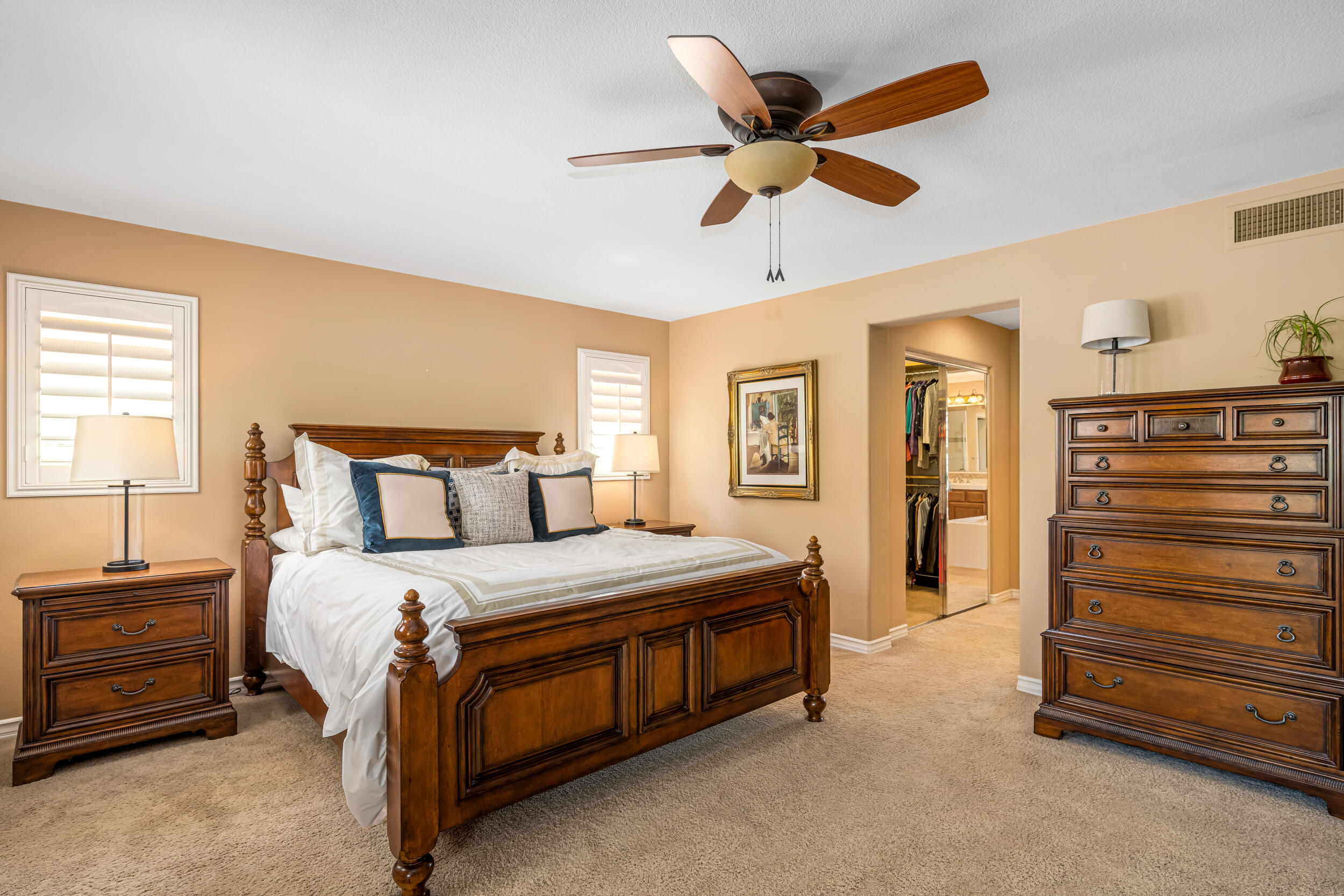 729 Salveson Road Brea, CA 92821 - Photo 13 of 43 a bedroom with a bed and a ceiling fan