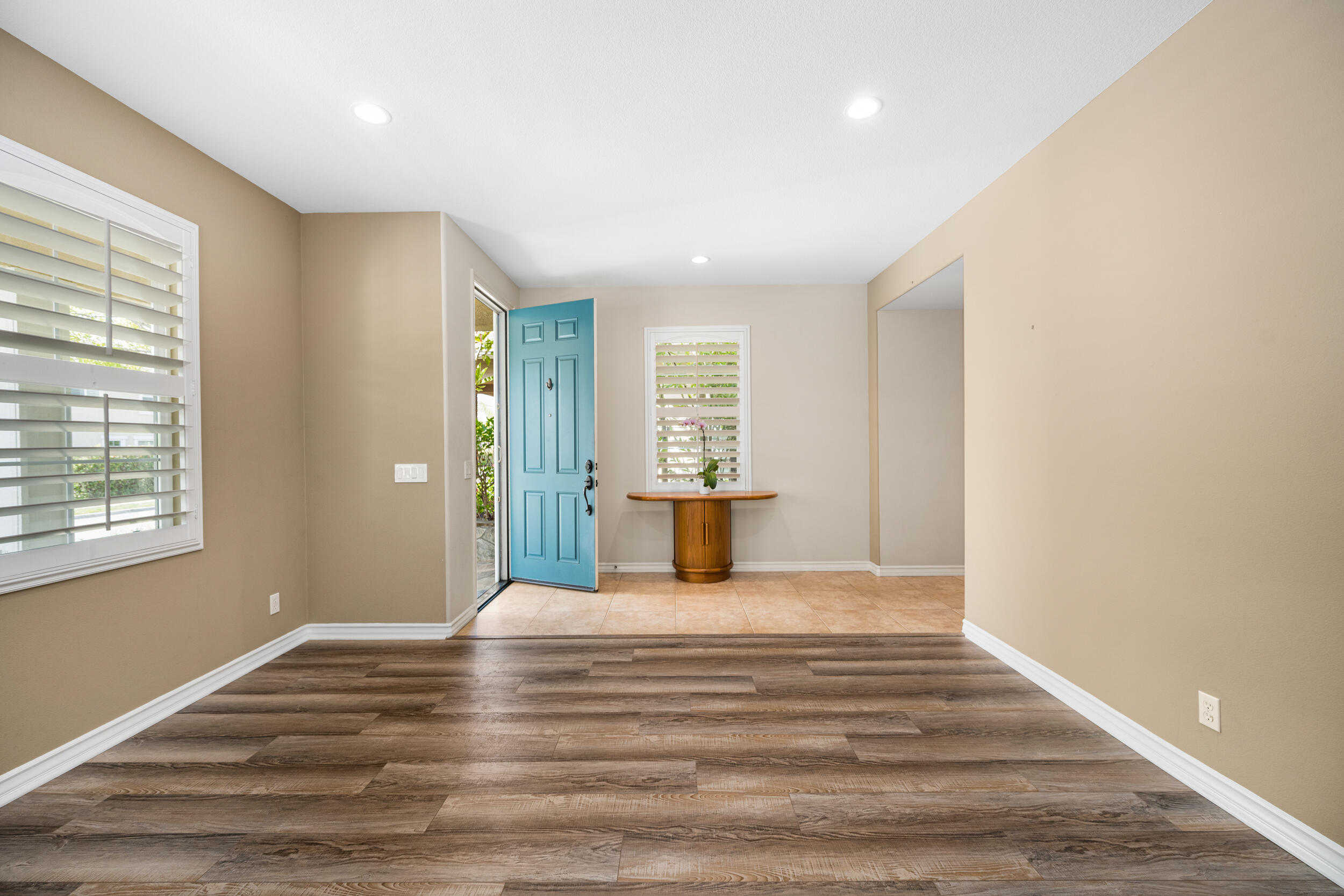 729 Salveson Road Brea, CA 92821 - Photo 19 of 43 a view of an empty room with wooden floor and a window