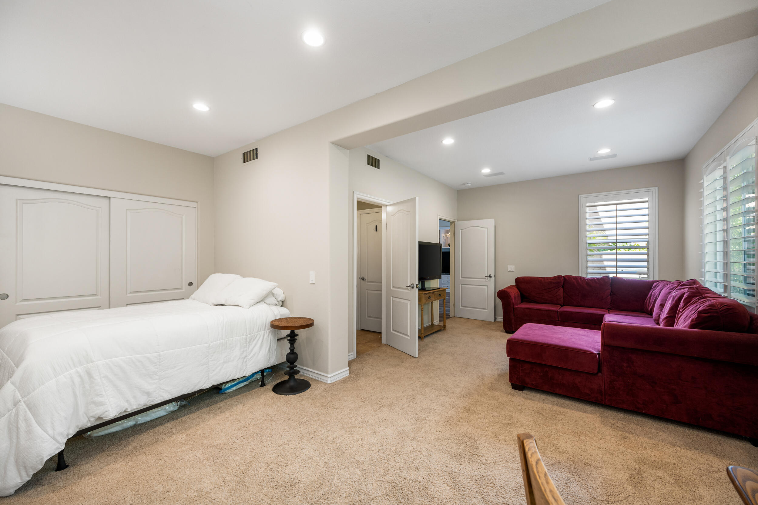 729 Salveson Road Brea, CA 92821 - Photo 20 of 43 a bedroom with a bed and a couch