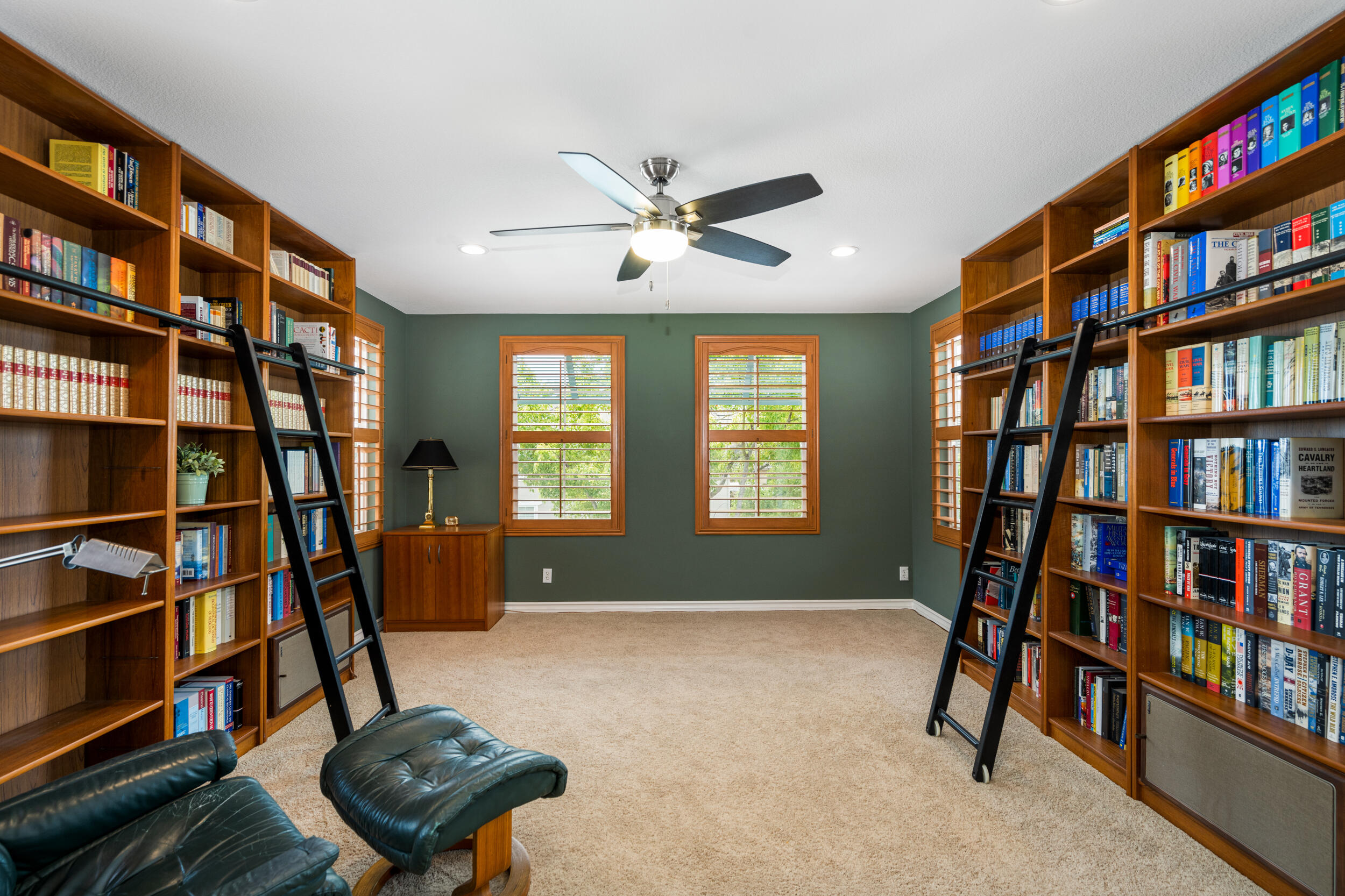 729 Salveson Road Brea, CA 92821 - Photo 27 of 43 a living room with a book shelf and a book shelf