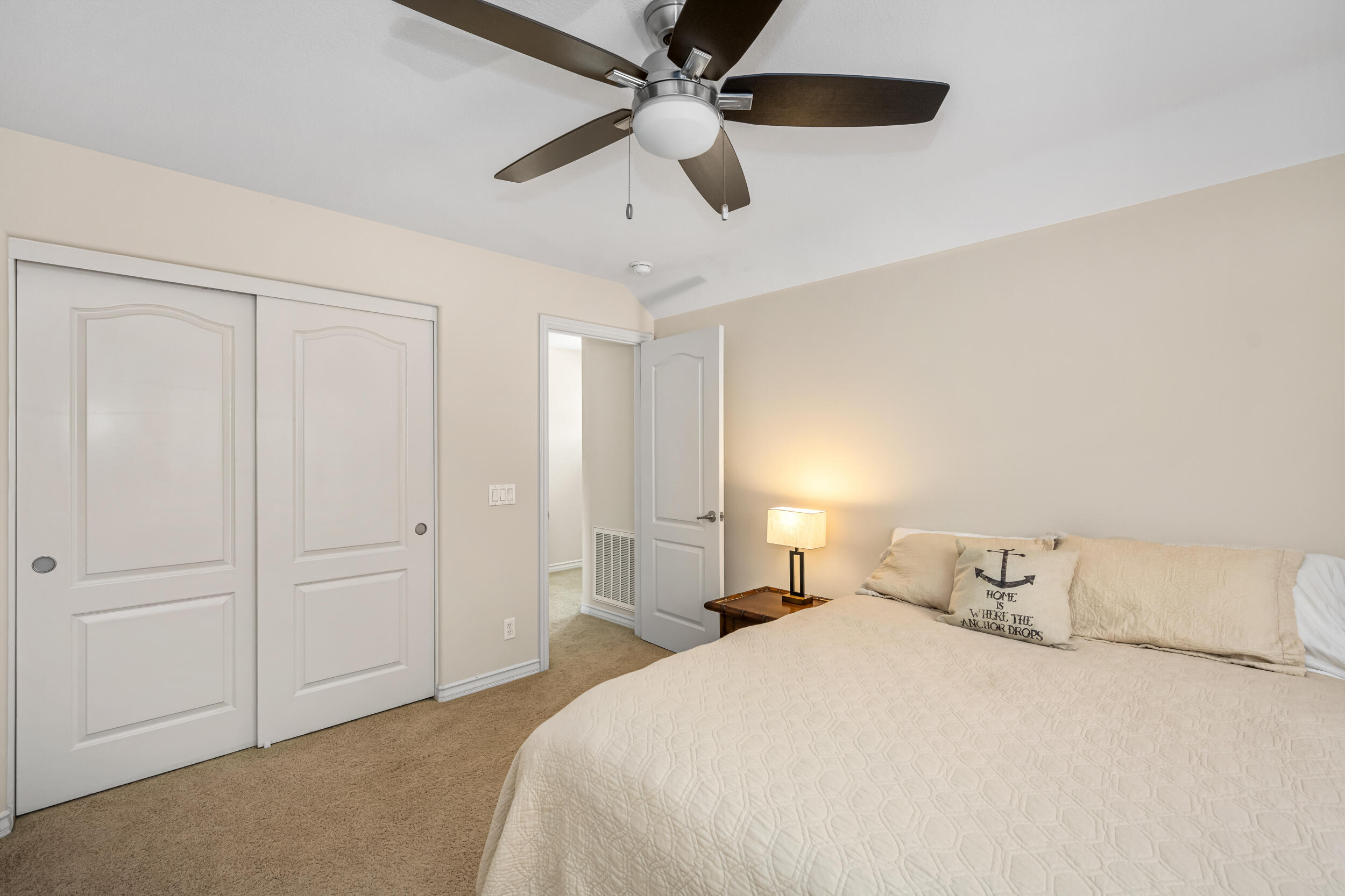 729 Salveson Road Brea, CA 92821 - Photo 28 of 43 a bedroom with a large bed and a ceiling fan