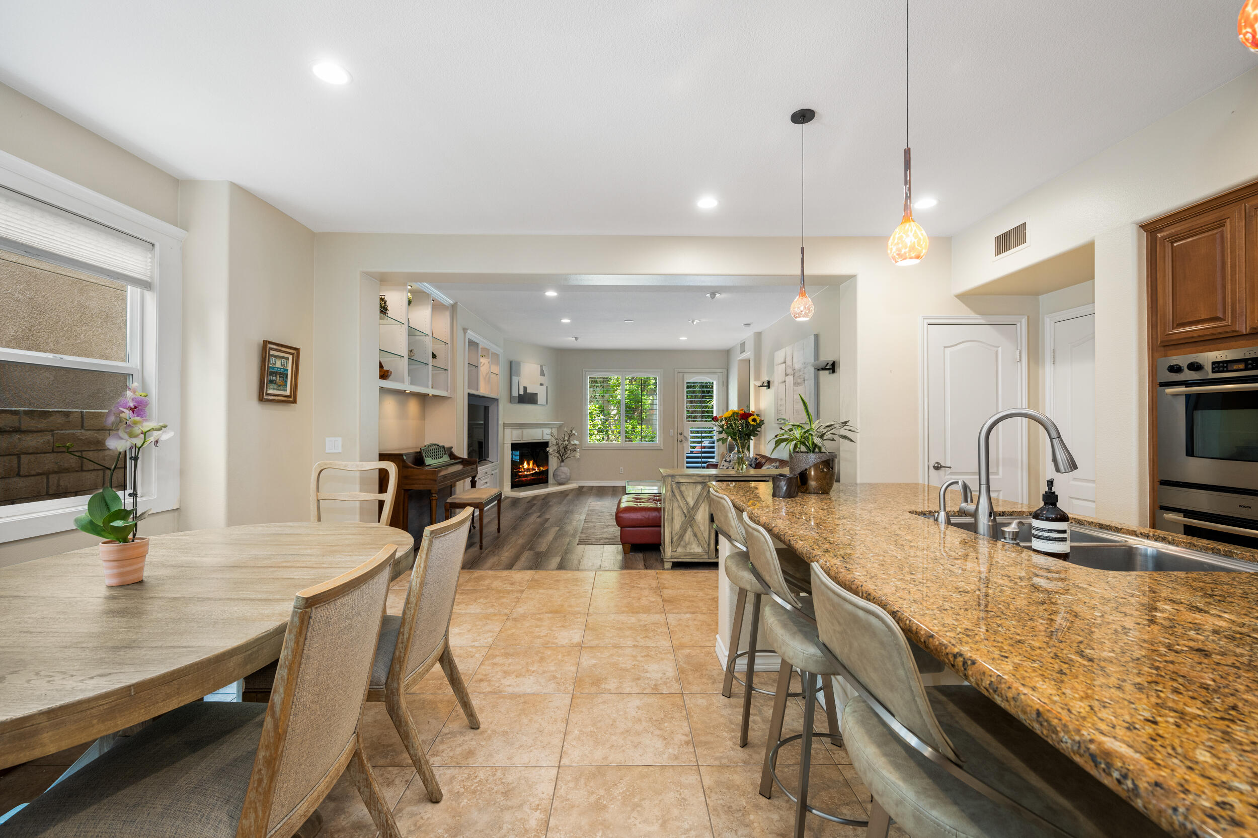 729 Salveson Road Brea, CA 92821 - Photo 3 of 43 a kitchen with sink a counter and chairs