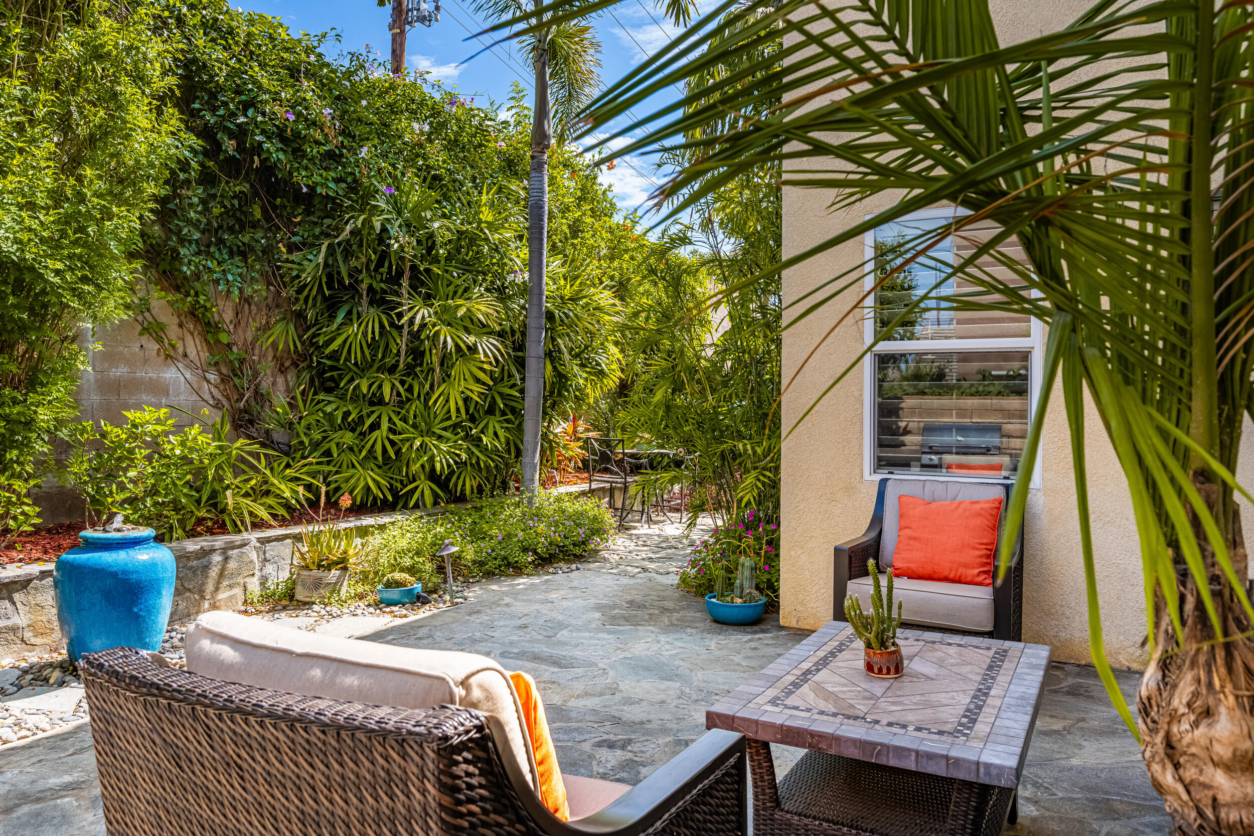 729 Salveson Road Brea, CA 92821 - Photo 33 of 43 a wooden bench sitting in front of a building