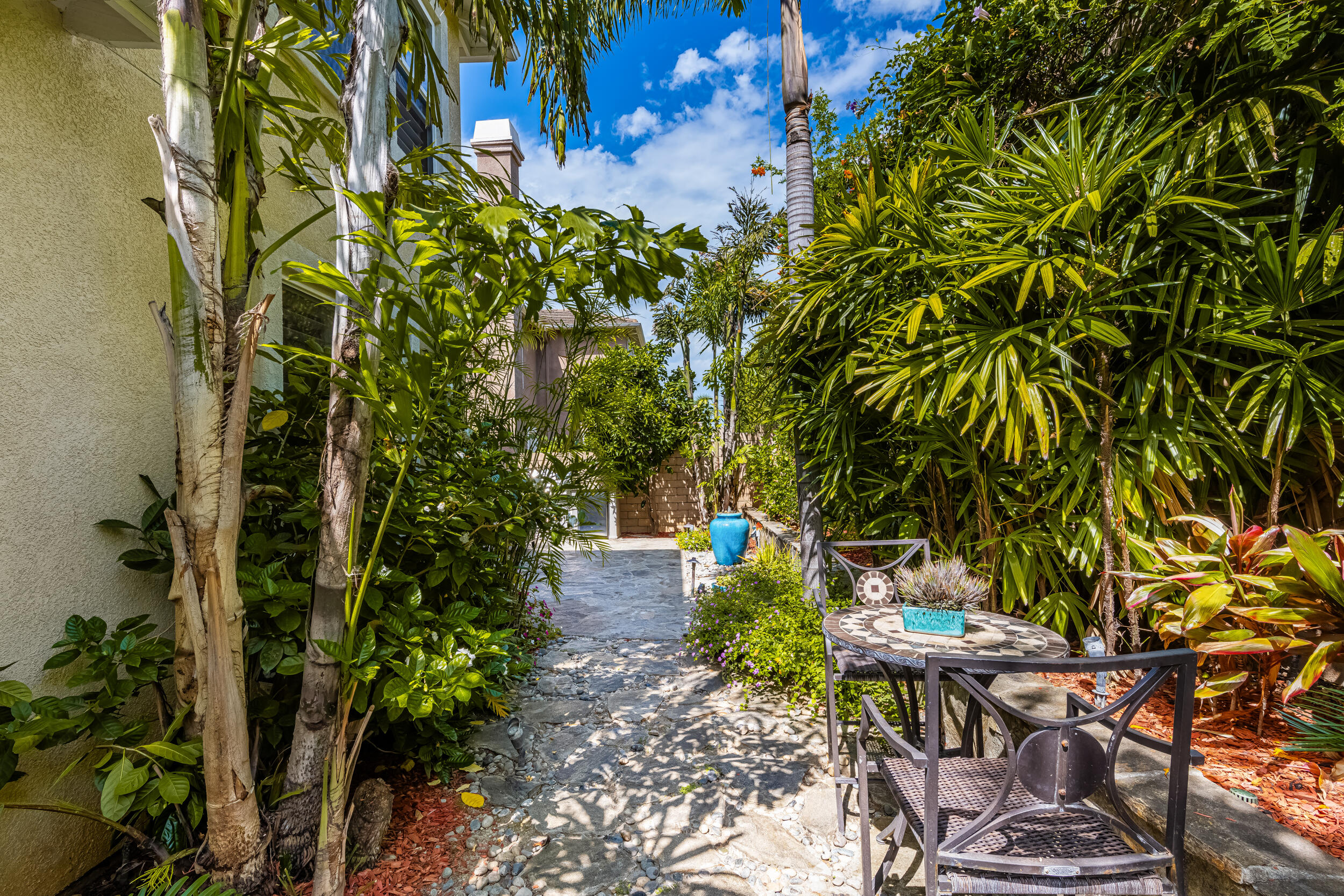 729 Salveson Road Brea, CA 92821 - Photo 35 of 43 a backyard with chairs and potted plants