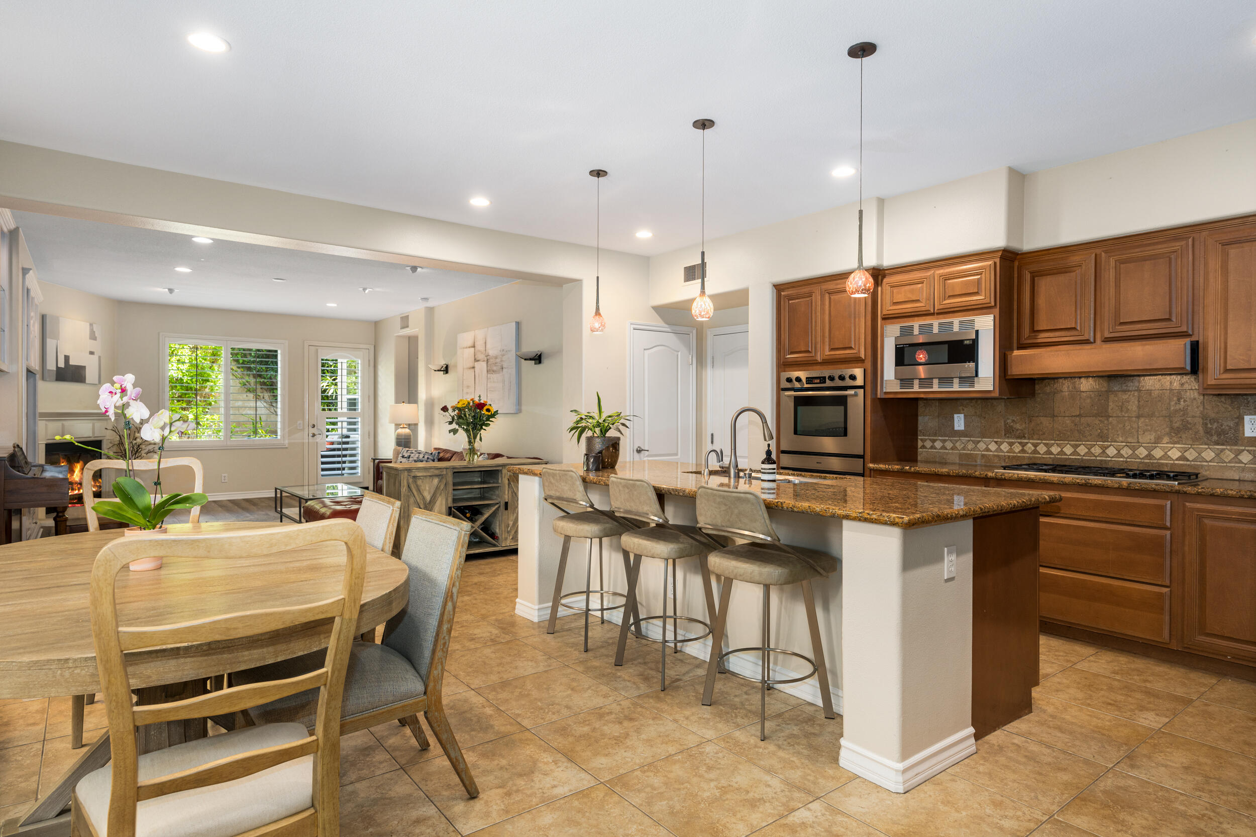 729 Salveson Road Brea, CA 92821 - Photo 6 of 43 a large kitchen with a table and chairs