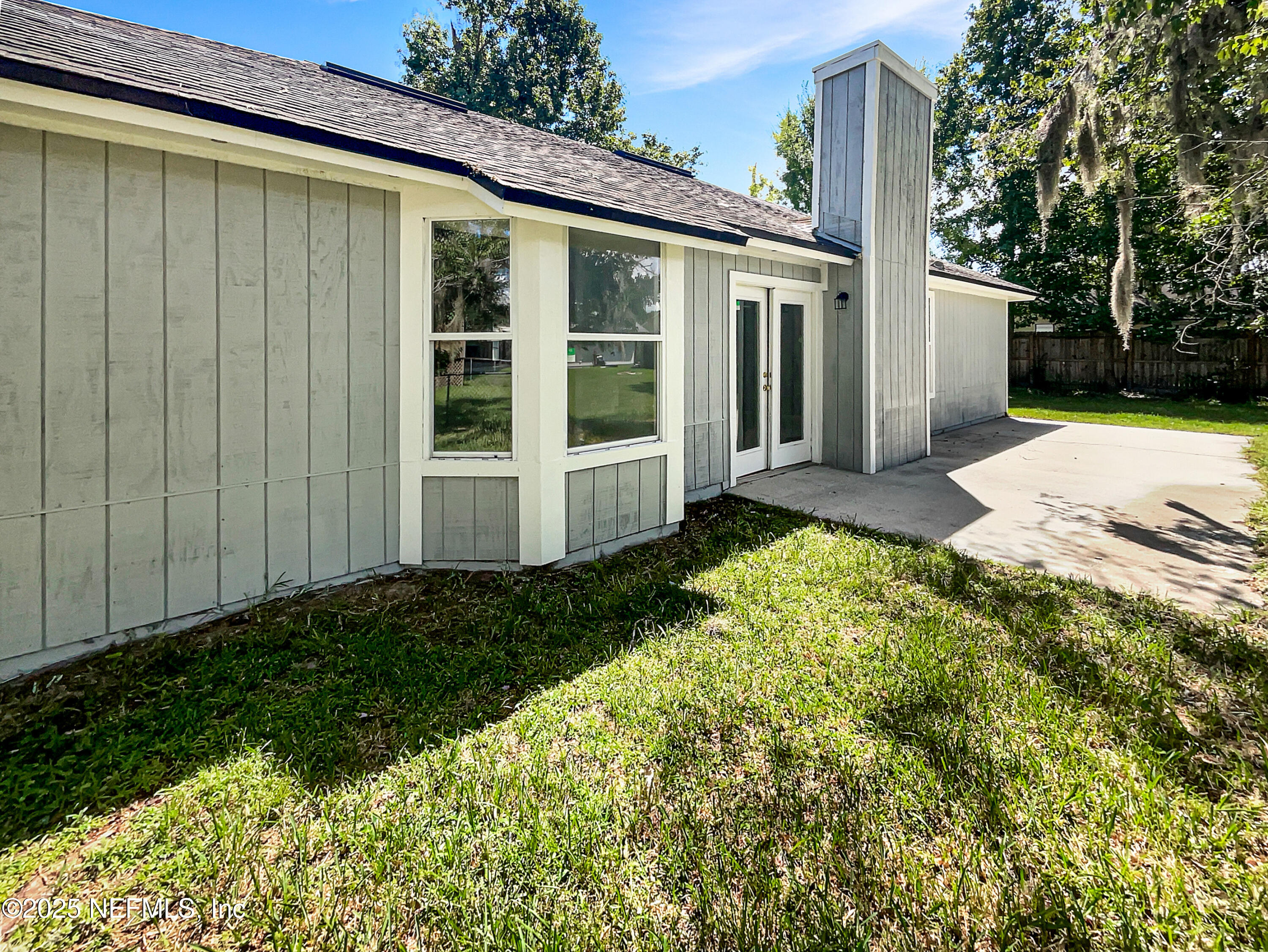2058 Manucy Court Middleburg, FL 32068 - Photo 17 of 18 a view of a house with backyard