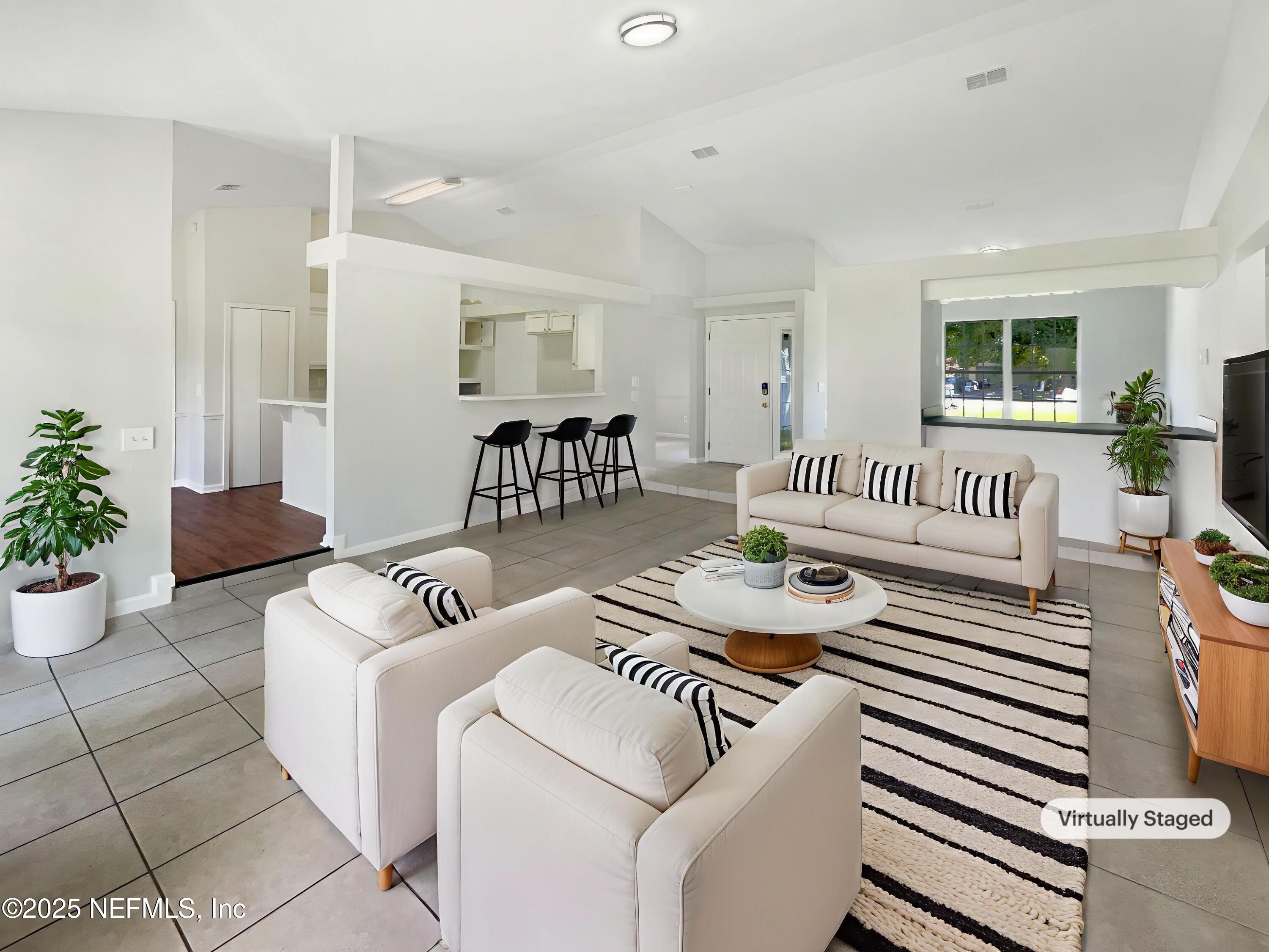 2058 Manucy Court Middleburg, FL 32068 - Photo 3 of 18 a living room with furniture and a window