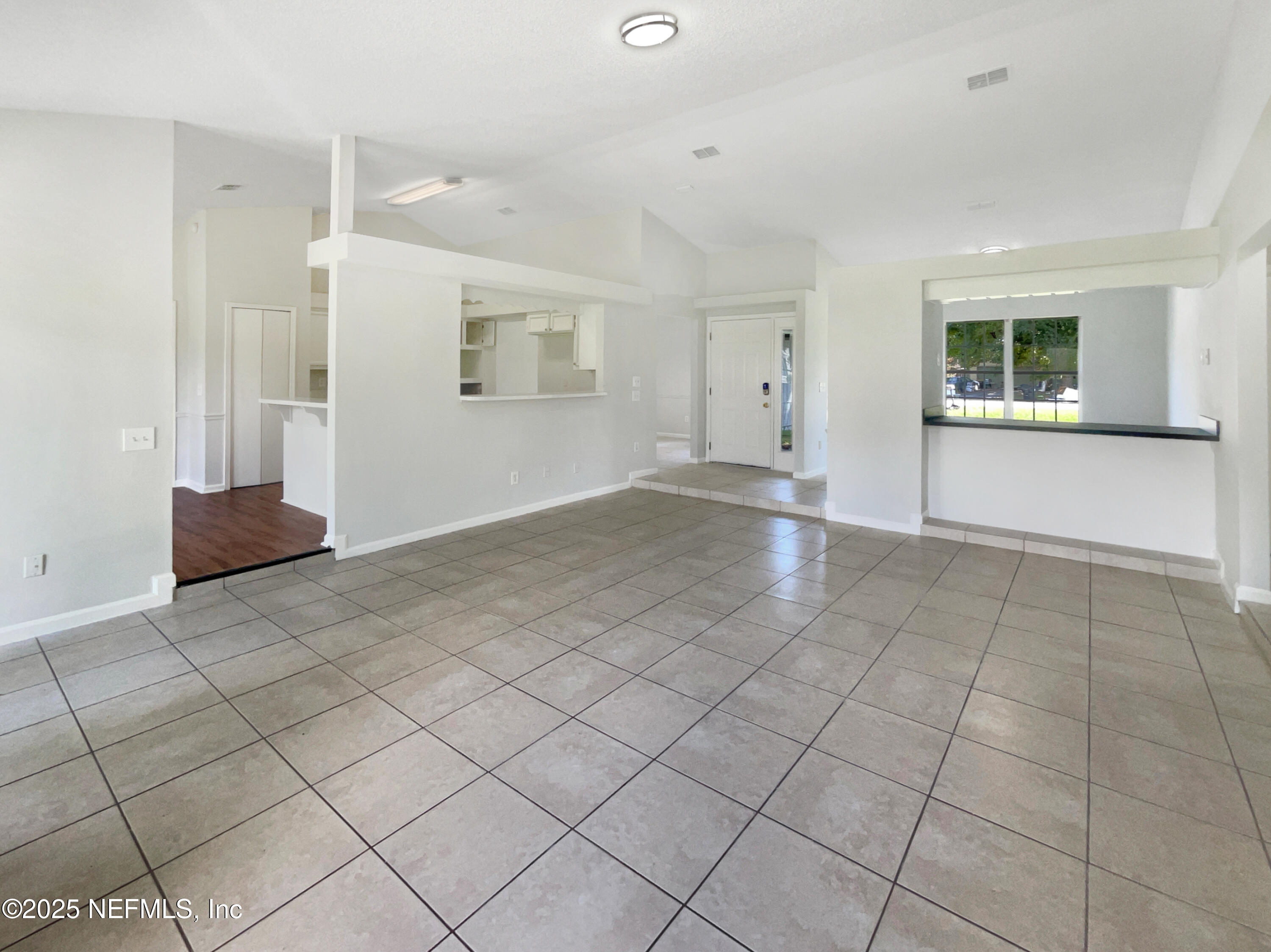 2058 Manucy Court Middleburg, FL 32068 - Photo 4 of 18 a view of an empty room with a window