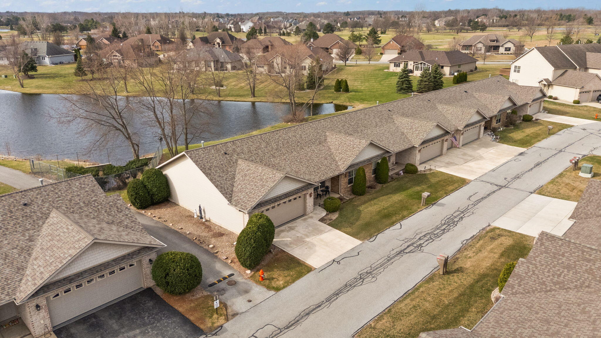 901 Veterans Lane Crown Point, IN 46307 - Photo 2 of 40 an aerial view of a house with a yard