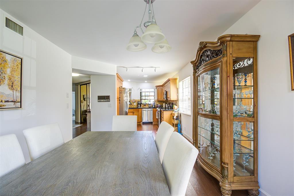 18258 Covina Way, Unit 102 Boca Raton, FL 33498 - Photo 5 of 26 a view of a living room and dining room