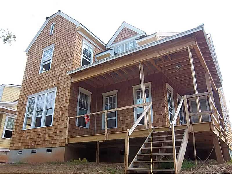 7425 Samples Field Road Cumming, GA 30040 - Photo 1 of 1 Exterior Front. wrap around front porch