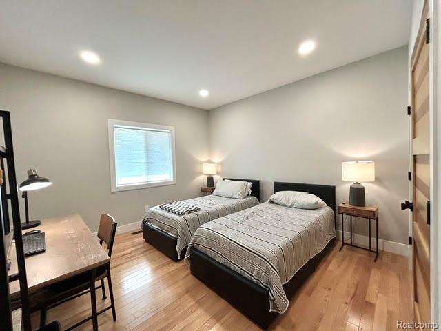 39 Stark Road Rochester, MI 48307 - Photo 42 of 70 4th of 4 bedrooms on the 1st floor. All bedrooms have LED recessed lighting and hardwood floors and spacious closets in each