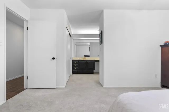 a view of a house with a yard and tree