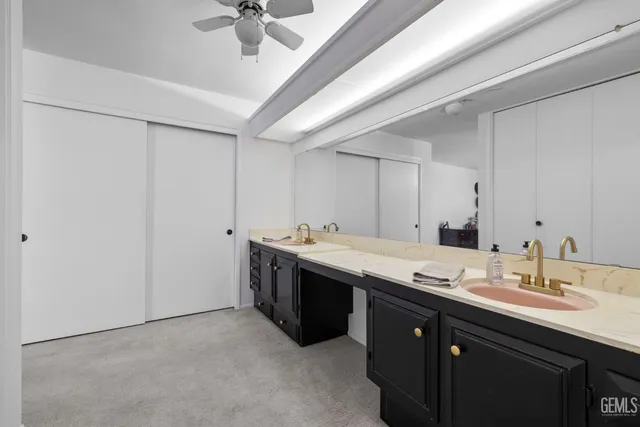 a view of a house with a yard and tree s