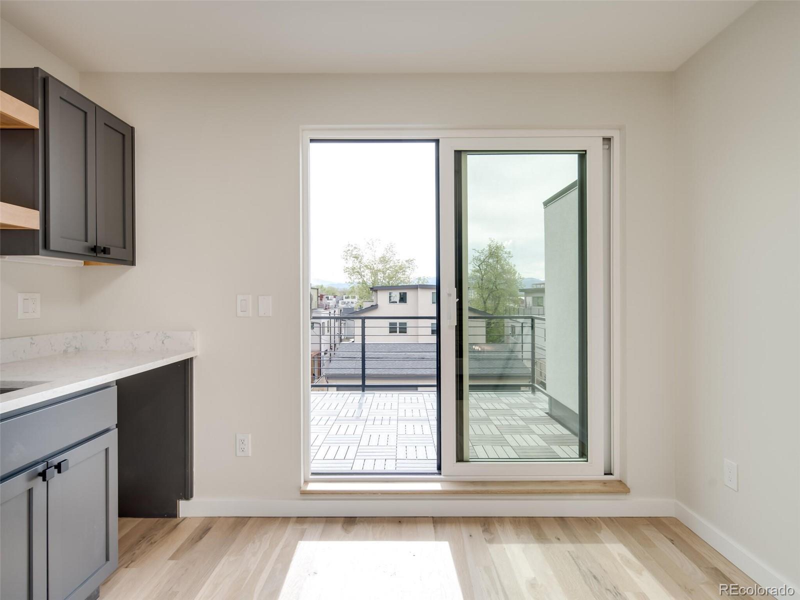 2187 Julian Street Denver, CO 80211 - Photo 14 of 20 a view of a room that has a window in it