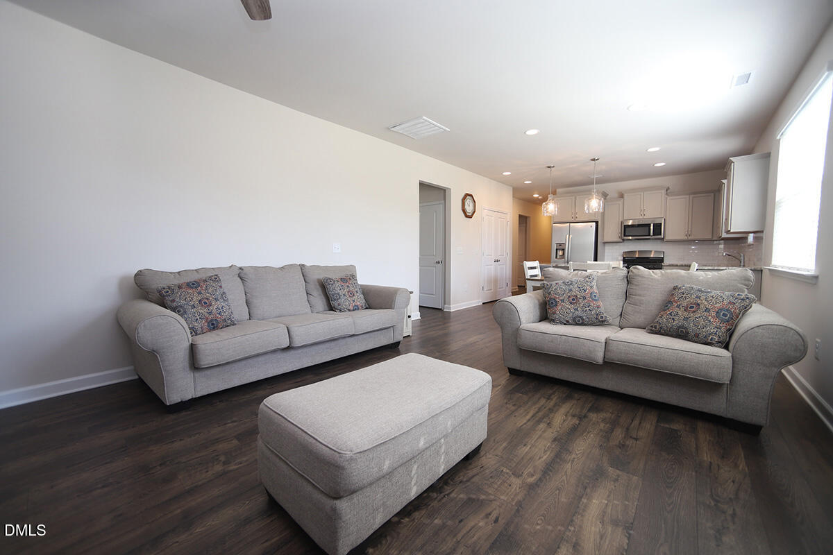 125 Mae Court Roxboro, NC 27573 - Photo 12 of 30 a living room with furniture and a couch