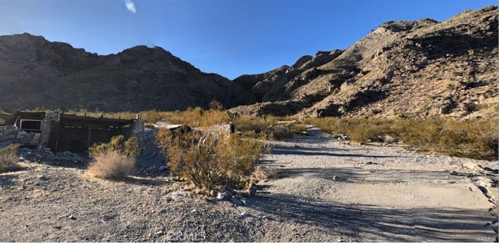 0 Ranch Road Essex, CA 92332 - Photo 4 of 10 a view of a yard with wooden fence