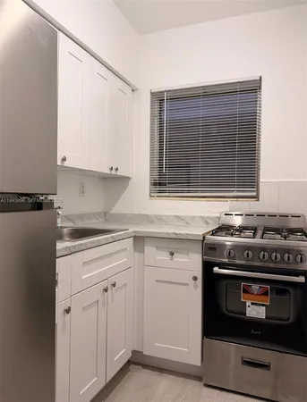 $1,450 | 7717 Byron Avenue, Unit 9, Miami Beach, FL 33141