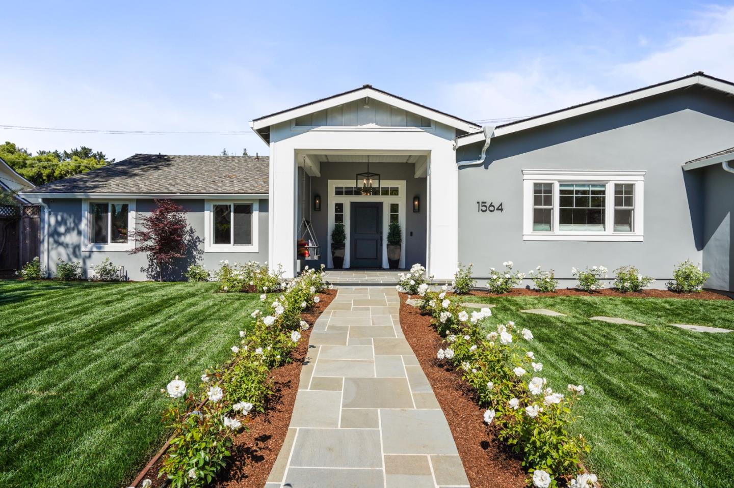 1564 Meadow Lane Mountain View, CA 94040 - Photo 1 of 36 a front view of a house with a yard