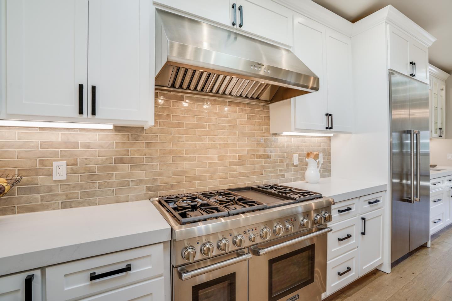 1564 Meadow Lane Mountain View, CA 94040 - Photo 11 of 36 a white stove top oven sitting inside of a kitchen