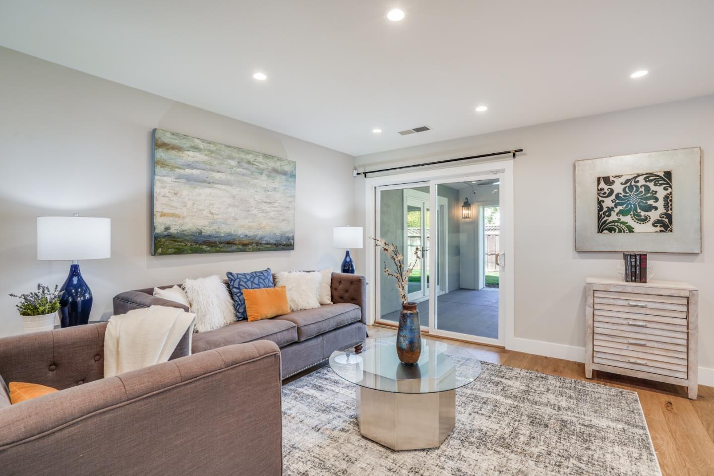1564 Meadow Lane Mountain View, CA 94040 - Photo 15 of 36 a living room with furniture and wooden floor