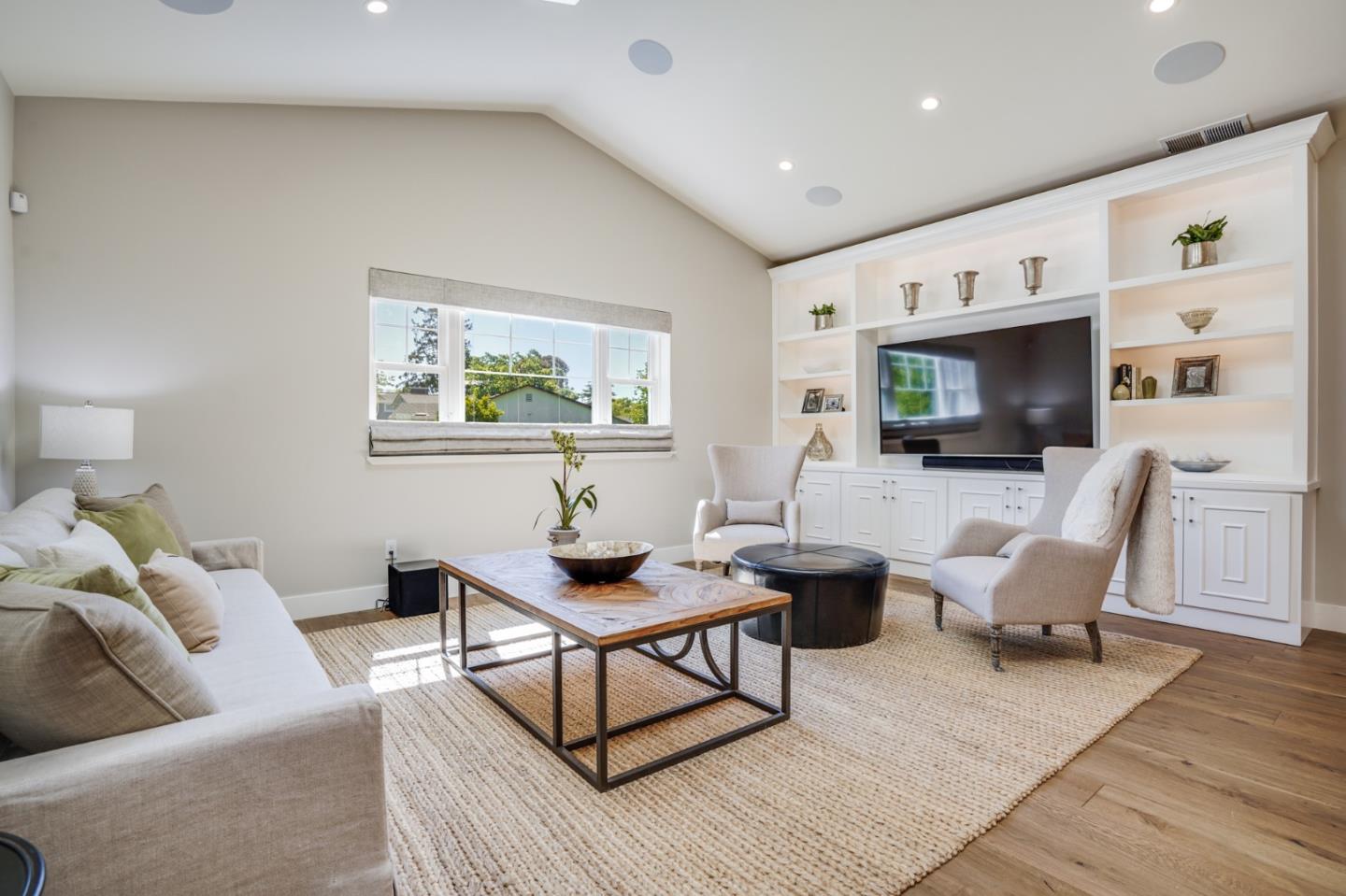 1564 Meadow Lane Mountain View, CA 94040 - Photo 3 of 36 a living room with furniture and a flat screen tv