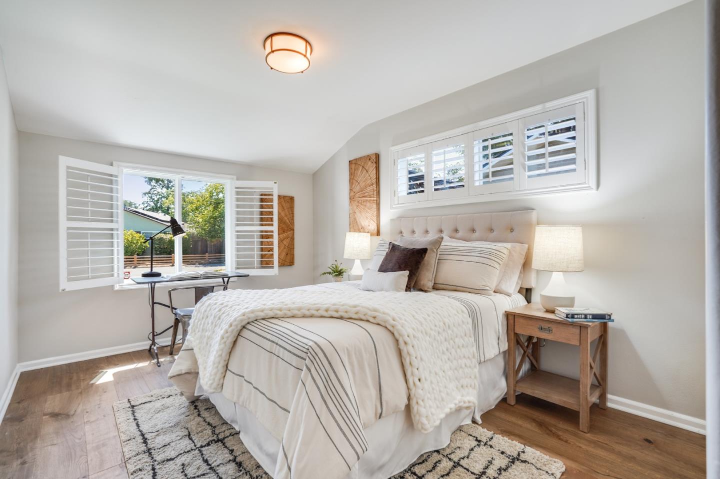 1564 Meadow Lane Mountain View, CA 94040 - Photo 22 of 36 a bedroom with a bed and a large window