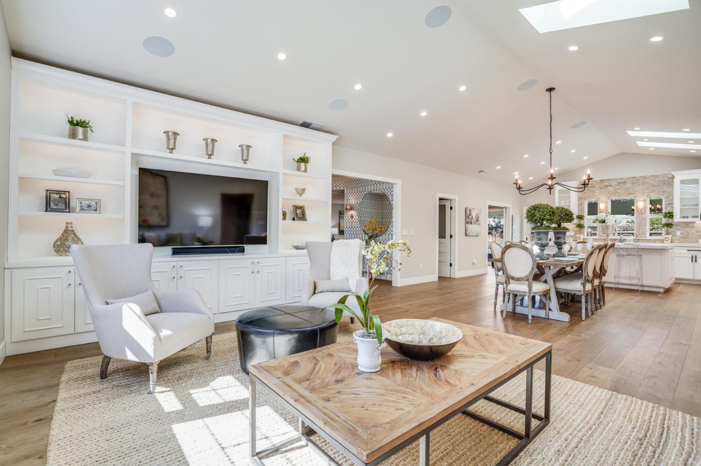 1564 Meadow Lane Mountain View, CA 94040 - Photo 4 of 36 a living room with furniture and a flat screen tv