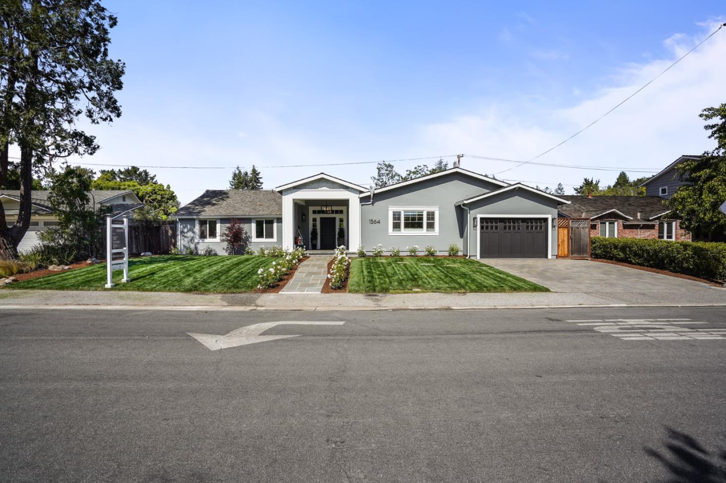 1564 Meadow Lane Mountain View, CA 94040 - Photo 36 of 36 a front view of a house with a yard and garage