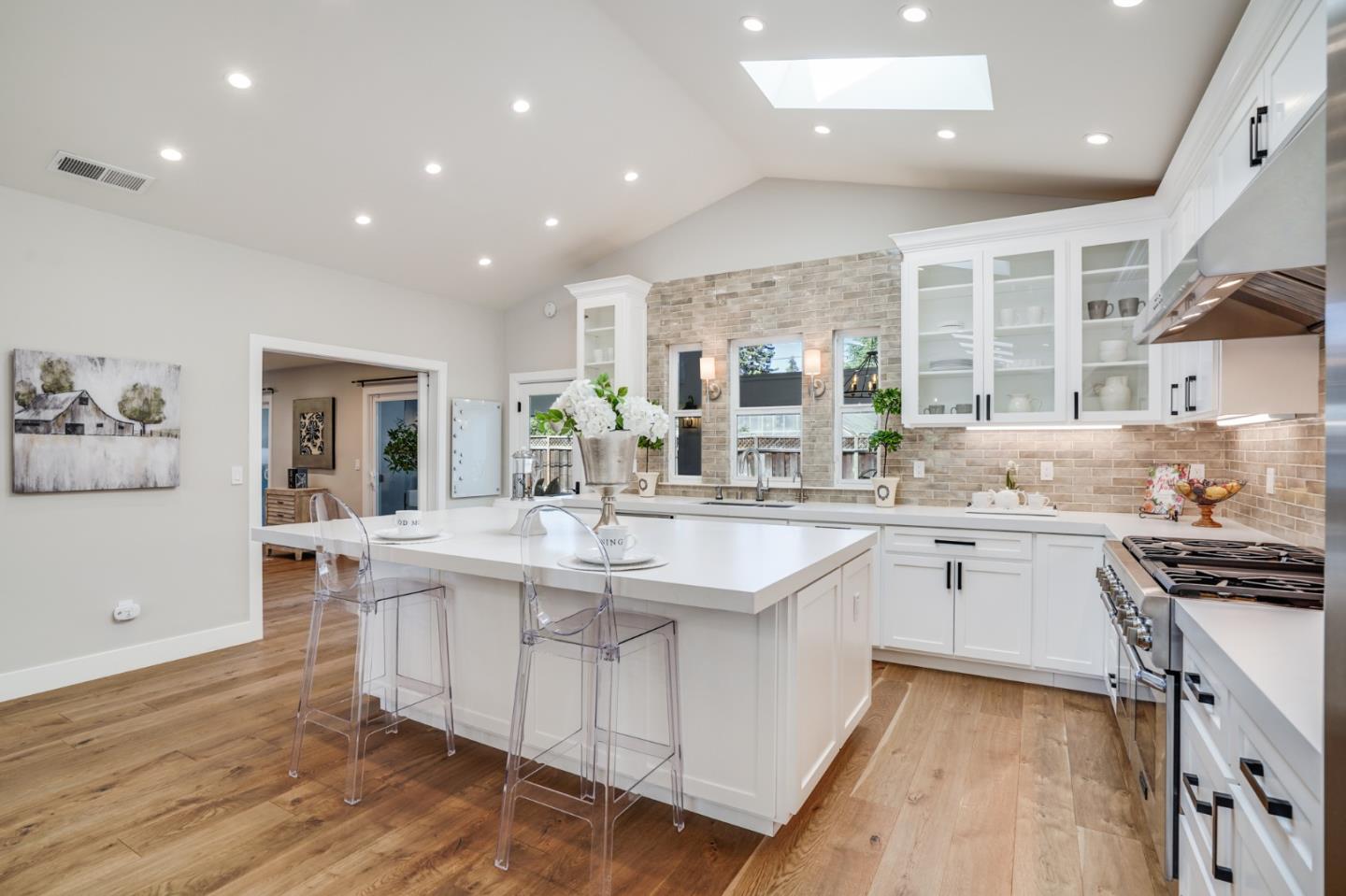 1564 Meadow Lane Mountain View, CA 94040 - Photo 7 of 36 a kitchen with stainless steel appliances granite countertop a sink and cabinets