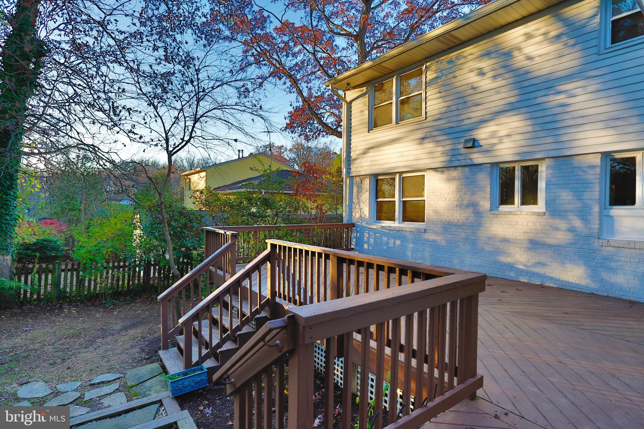 6308 Marywood Road Bethesda, MD 20817 - Photo 17 of 30 a view of a house with backyard and deck
