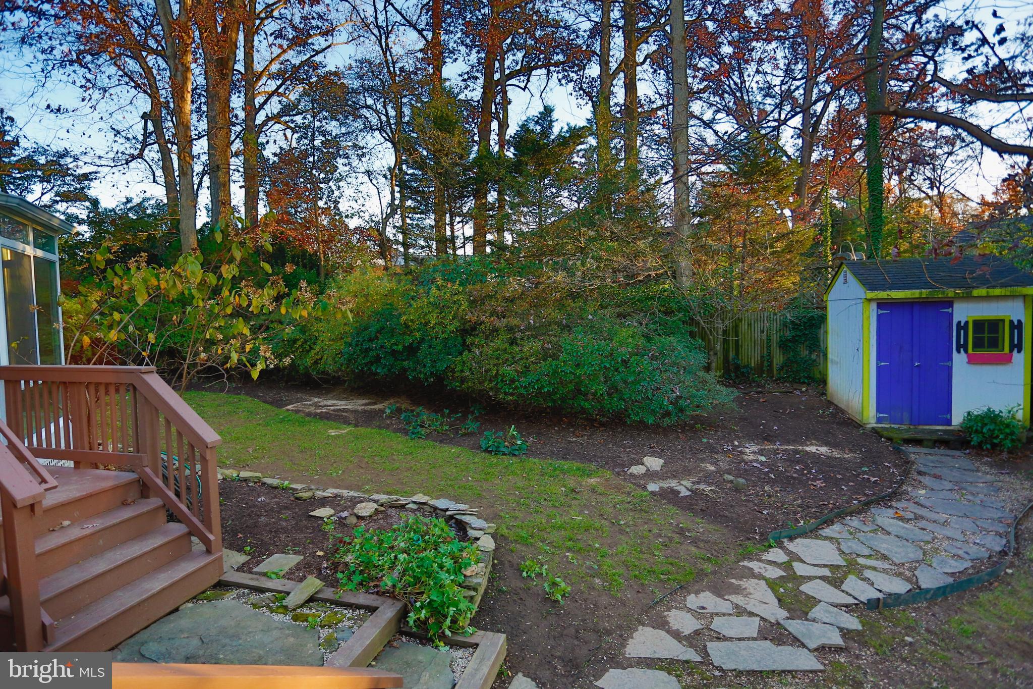 6308 Marywood Road Bethesda, MD 20817 - Photo 18 of 30 a view of a backyard with large trees